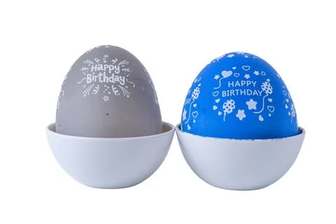 Blue and grey egg shaped kitchen timers isolated on a white background Stock Photos