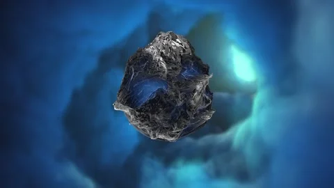 A blue and grey object is floating in a dark space Stock Footage 271181442