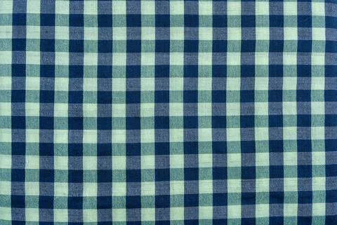 Blue and light green gingham fabric texture with woven squares textile Stock Photos