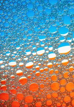 Blue and orange bubbles Stock Photos