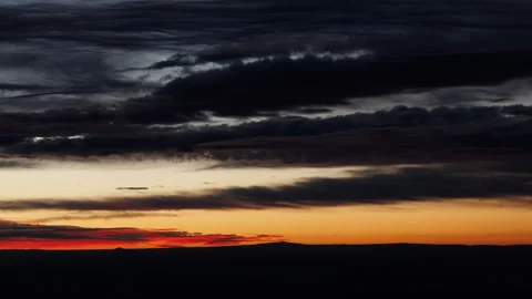 Blue and Orange Cloudy Sky Before Sunrise Zoom In Timelapse Stock Footage 274409038
