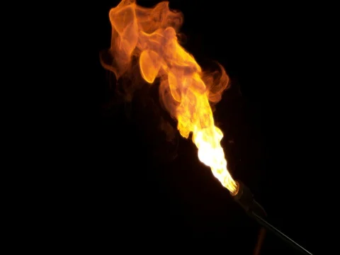 Blue and Orange Fire From Flame Thrower Stock Footage 77782260