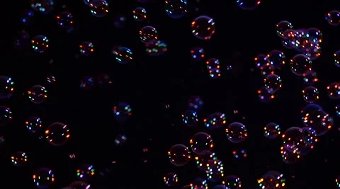 Blue and orange soap bubbles on black, background, close up, slow motion Stock Footage 53021025