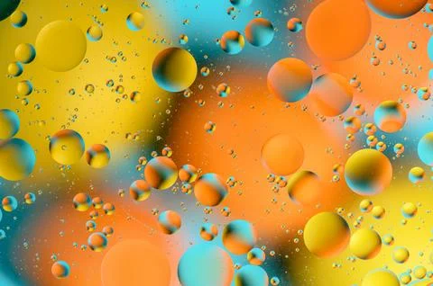 Blue and orange spots with multi-colored circles similar to the galaxy and .. Stock Photos