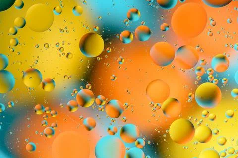 Blue and orange spots with multi-colored circles similar to the galaxy and .. Stock Photos