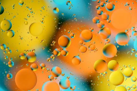 Blue and orange spots with multi-colored circles similar to the galaxy and .. 写真素材