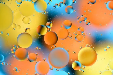 Blue and orange spots with multi-colored circles similar to the galaxy and .. 写真素材