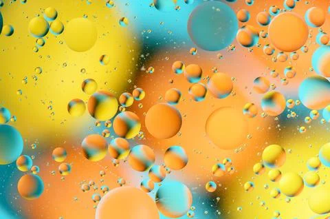 Blue and orange spots with multi-colored circles similar to the galaxy and .. Stock Photos