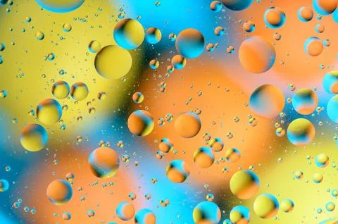 Blue and orange spots with multi-colored circles similar to the galaxy and .. 写真素材