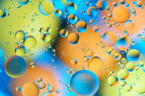 Blue and orange spots with multi-colored circles similar to the galaxy and .. 写真素材