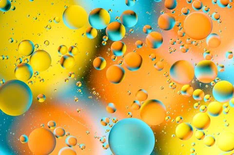 Blue and orange spots with multi-colored circles similar to the galaxy and .. 写真素材