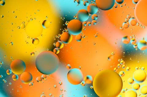 Blue and orange spots with multi-colored circles similar to the galaxy and .. 写真素材