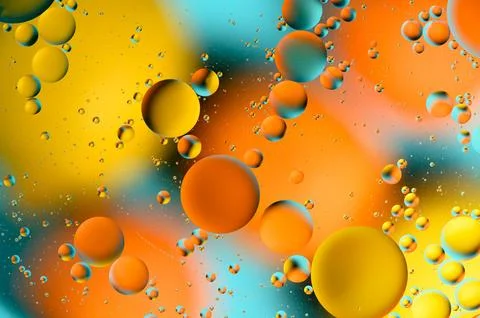 Blue and orange spots with multi-colored circles similar to the galaxy and .. 写真素材