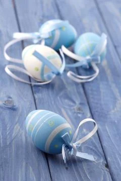 Blue and pink easter eggs on blue background Foto stock
