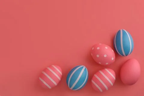 Blue and pink Easter eggs on a pink background. White striped Eggs . Stock Photos