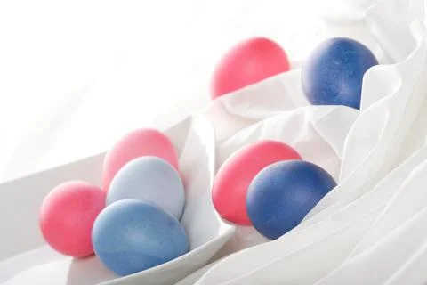 Blue and pink easter eggs on white background Stock Photos