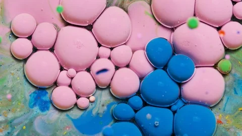 Blue and pink inks react to form a beautiful structure of paint bubbles. Stock Footage 121222779