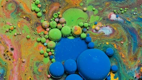 Blue and pink inks react to form a beautiful structure of paint bubbles. Stock Footage 121223053