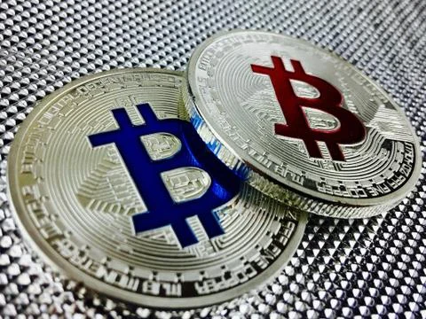 Blue and red bitcoin Stock Photos