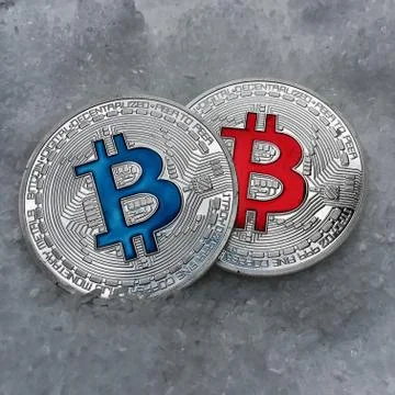 Blue and red bitcoin Stock Photos