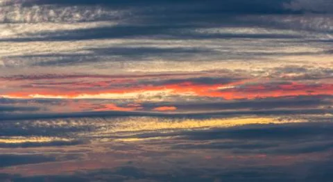 Blue and Red Clouds and Sunset Stock Photos