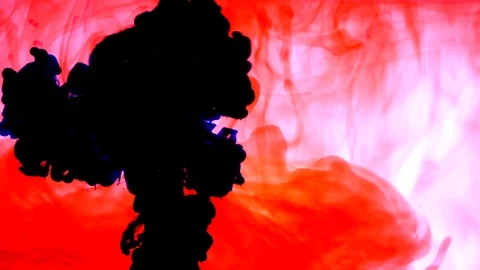 Blue and Red Ink mixing together over a pure white background Stock Footage
