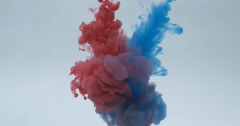 Blue and red ink mixing in water Stock Footage 148962837