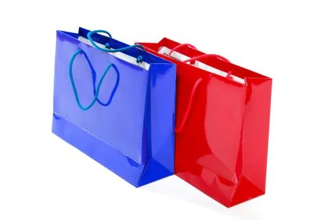 Blue and red packets isolated on a white background. Stock Photos