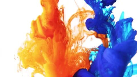 Blue and red paint or ink is poured into the water. Stock Footage 196915248