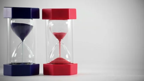 Blue and red sandtimer - voting, red winning Stock Footage 252521657