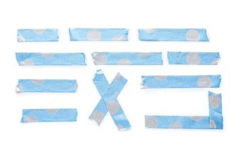 Blue and silver polka dot washi tape strips and cross shape isolated on white Stock Photos