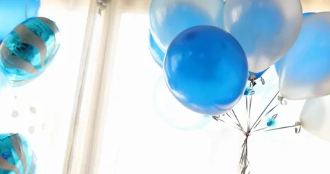 Blue and white balloon floating decoration in anniversary celebration party Stock Footage 86025107