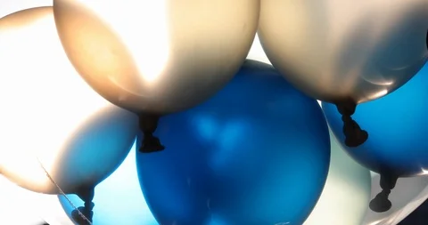 Blue and white balloon floating swivel decoration in birthday anniversary celebr Video stock 86806662