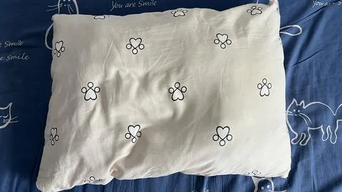 Blue and White Bedding Set with Cute Cat Illustrations and Paw Prints Stock Photos