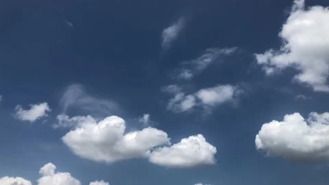Blue and white clouds on a sunny day Stock Footage 239504581