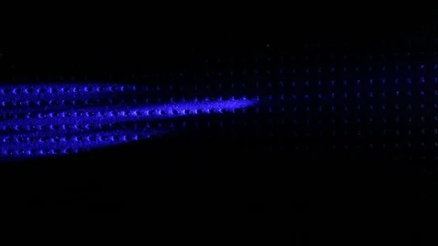 The blue and white curly rays move on a black background Stock Footage 101849100