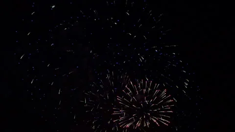 Blue and White Fireworks Exploding in Dark Night Sky at Light Fest Stock Footage 340883395