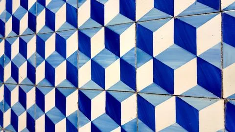 Blue and white geometric ceramic tile pattern wall Stock Photos