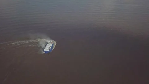 Blue and white hovercraft with propeller turns around Video stock 155286597