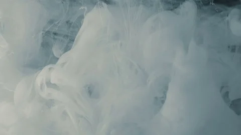 Blue and white ink dropped in water on white background shooting with high speed Stock Footage 75595387