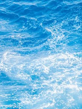 Blue and white open sea waves. Stock Photos