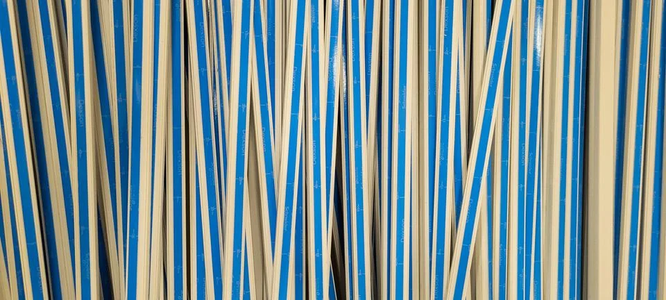 Blue and white plastic straw Stock Photos