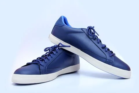Blue and White Unisex Shoe - Sneakers Stock Photos