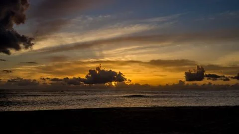 Blue and Yellow Sunset Clouds Stock Photos