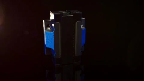 Blue Anodized Machined Aluminum Component on Black Surface, Product Shot Video stock 341494064