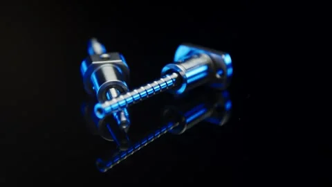 Blue Anodized Precision Component with Threaded Spindle, Black Studio, Close Up Stock Footage 341507031