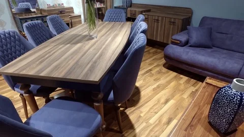 Blue artificial roses in a vase on a table Stock Footage 79236244