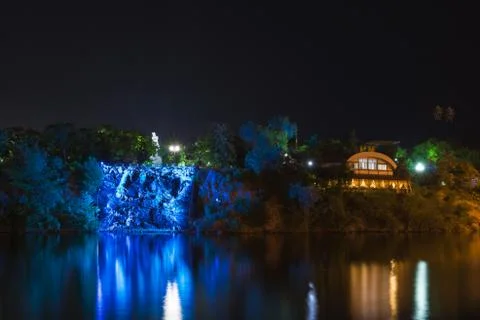Blue artificial waterfall Stock Photos