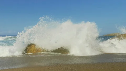 Blue Atlantic Ocean waves at the wild rocky beach Stock Footage 95546885