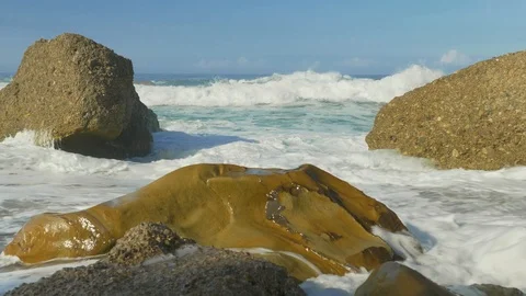 Blue Atlantic Ocean waves at the wild rocky beach Stock Footage 95548458